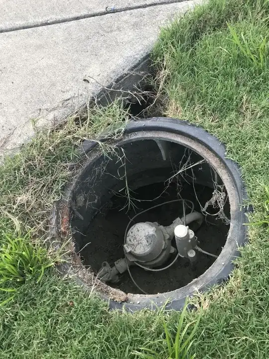 photo showing hole going underneath meter box