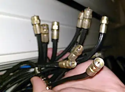 Disconnected coax cables in closet.