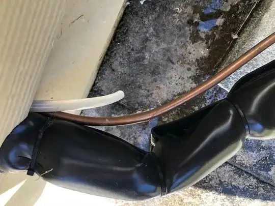 Outdoor heat pump unit with water pooling next to it