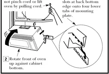 Setting rear of microwave on wall bar
