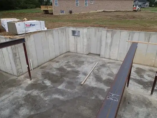 crack is under window well area