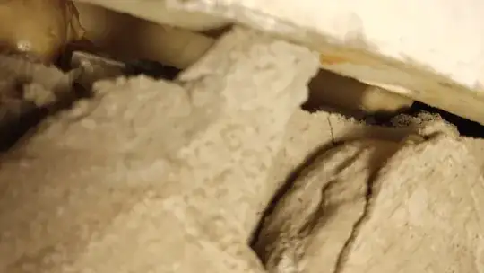 side view showing yellow PU foam and square factory-PU underneath the shower tray