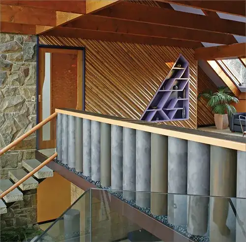 Water filled balustrades provide abundant thermal mass as part of this mezzanine balcony.
