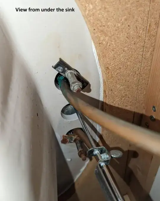 lines feeding up through sink deck