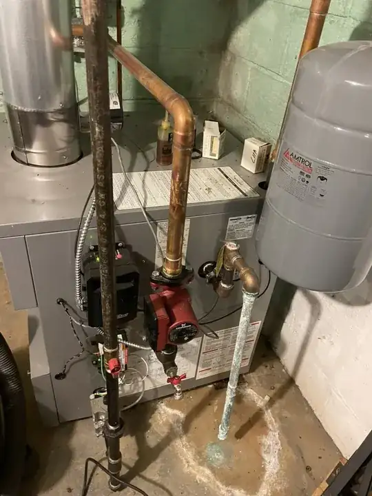 Boiler with the return pipe (black) on left