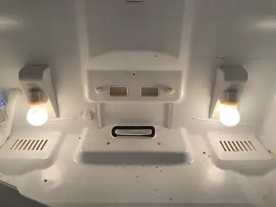 Bottom rear of fridge with housing and styrofoam block removed