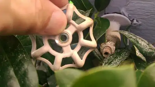 Outdoor faucet handle and broach