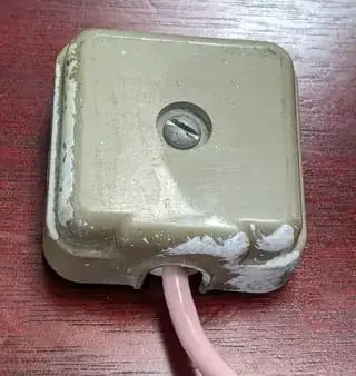 Terminal block with cord and cover in place