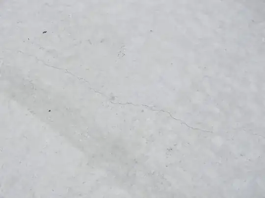 Long crack running from opposite corner of the same shower recess