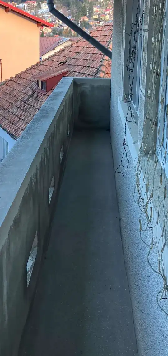 Balcony perspective with crack at far end corner