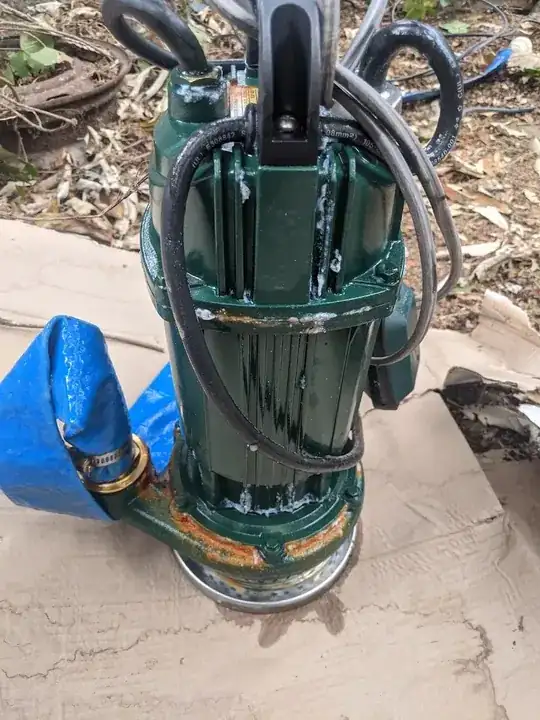 Water pump showing rust around the lower part of the housing