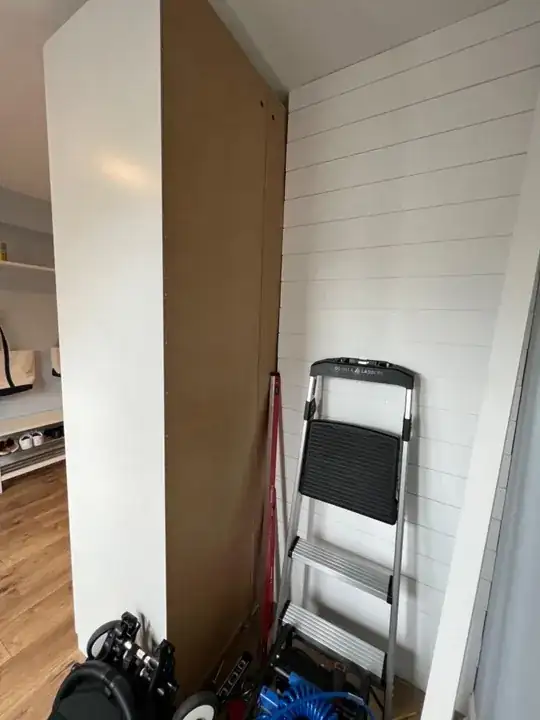 You can see there are actually two cabinets, about 24" wide total, with a seam about 5" from the end.