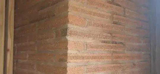 Chimney abutting two walls