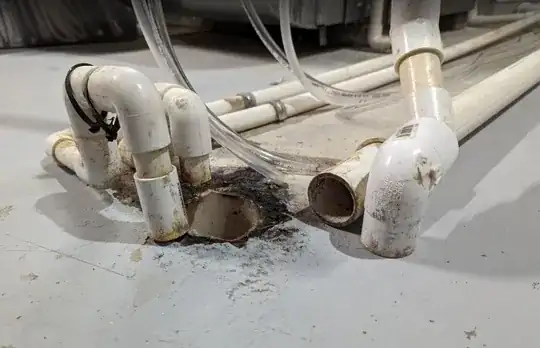 Pipes out of floor drain