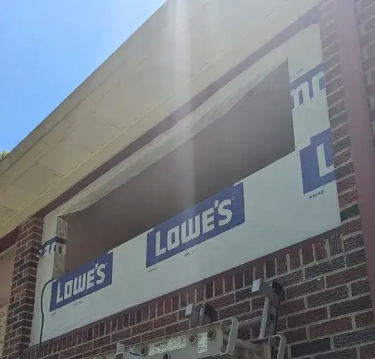 top window opening for housewrap should go over window head, sill is not flashed