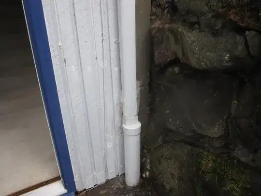 Water shooting up from downspout