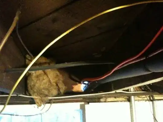 hole in the wooden exterior wall