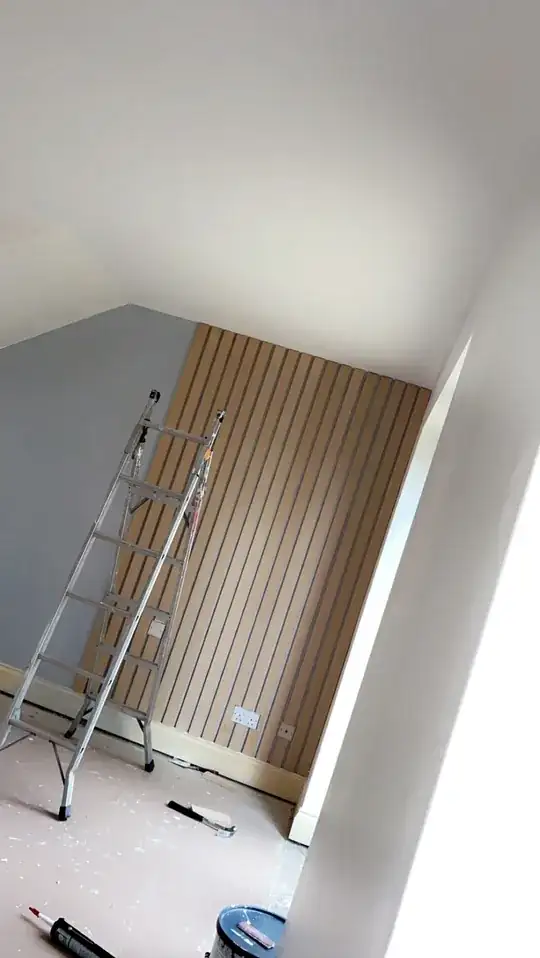 wood paneling along right side of wall