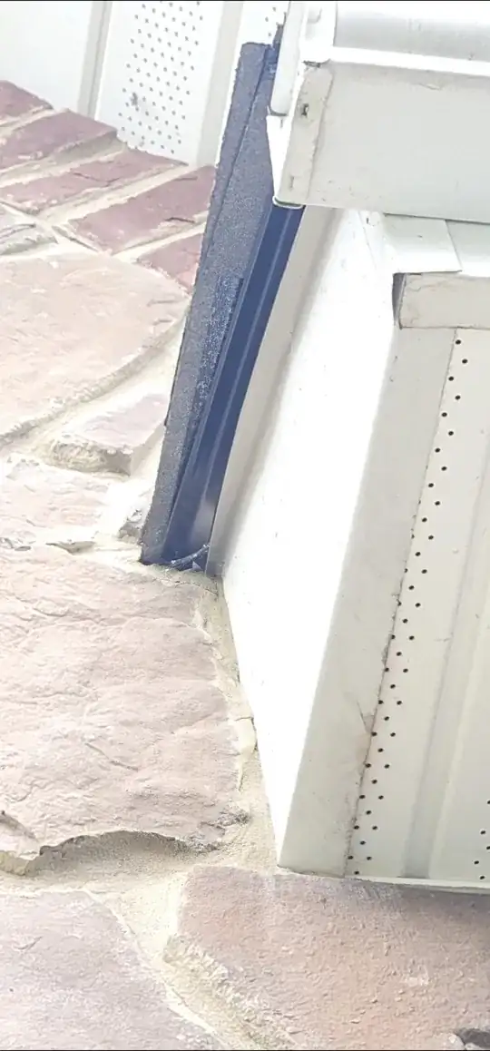 Shingles protruding past dripedge