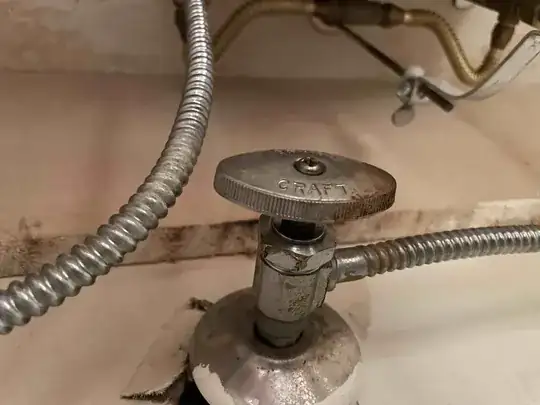 water line shutoff with corrugated line attached