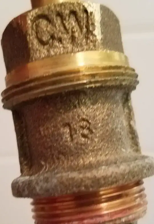 diverter valve stamped C.W. and 18