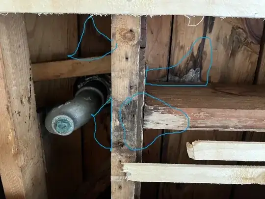 water stains on OP's under-shower picture