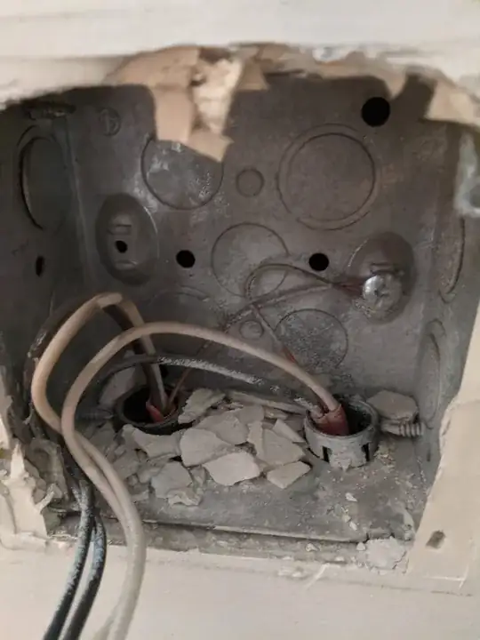 chipped material in electrical box