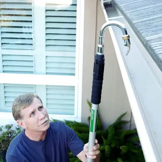 Look how happy one of these would make you! man cleaning his gutter