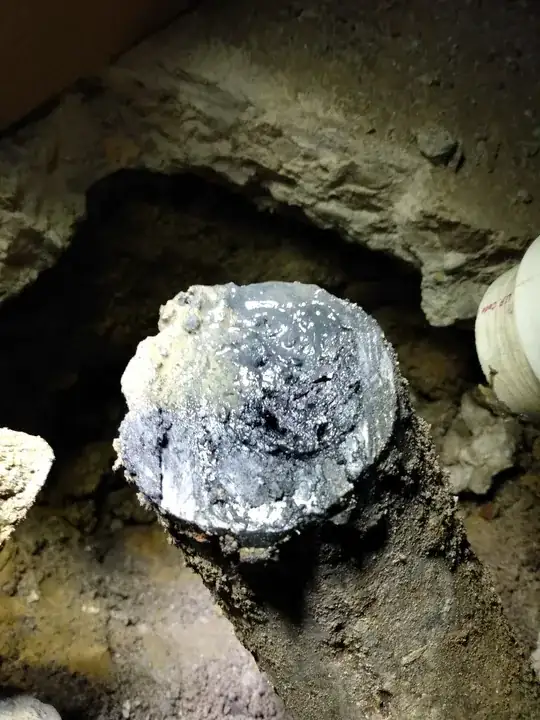 Sawzalled-off pipe showing the clogging