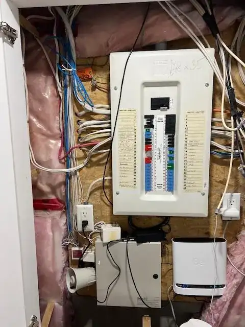 Photo of electrical panel and cabling