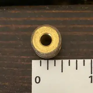 The brass spacer itself; top view.
