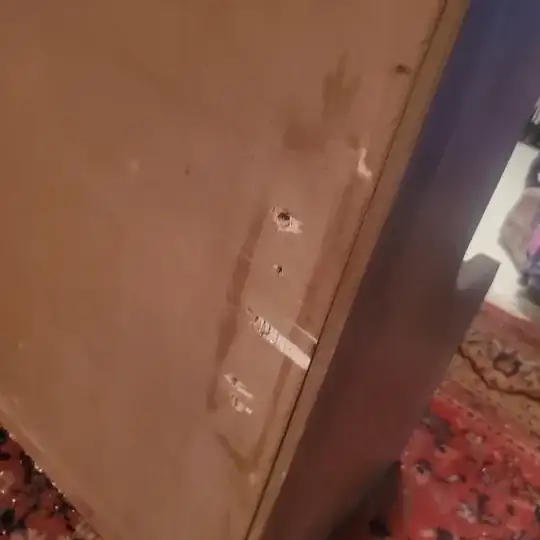 holes for screws in bottom of desk