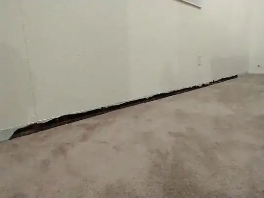 Drywall beneath molding had weakened and crumbled easily