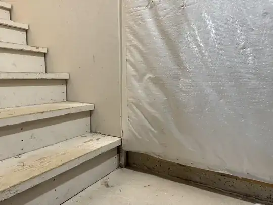 bottom of basement stairs