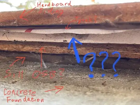 photo from ground looking up behind the siding