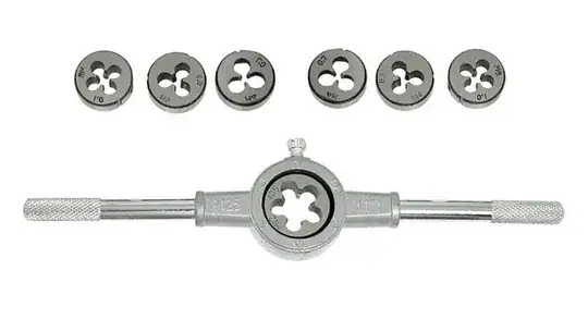 Generic photo of die holder tool and 7 dies, one installed in tool