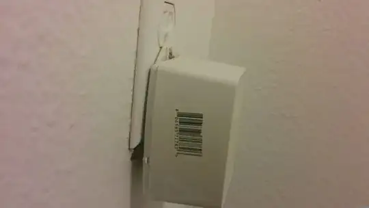 generic DC adapter plugged into electrical socket.