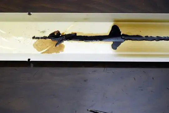 There was a black sticky substance on the inside cover of the housing