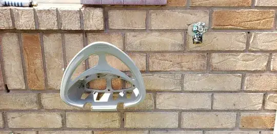 Newly installed hose hanger