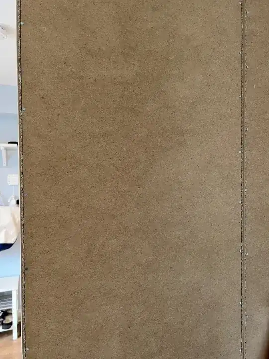 Close up of back panel and seam.between the two cabinets