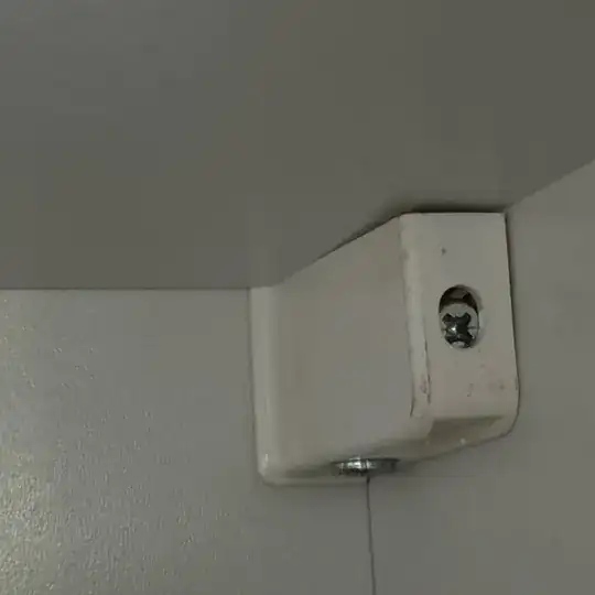 hardware that attaches a kitchen cabinet to the wall