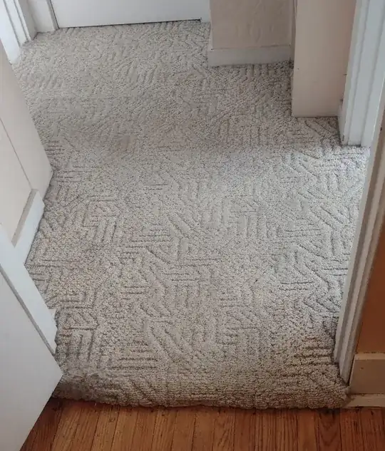 northward view of upper corridor, showing irregular outlines and small step at bedroom