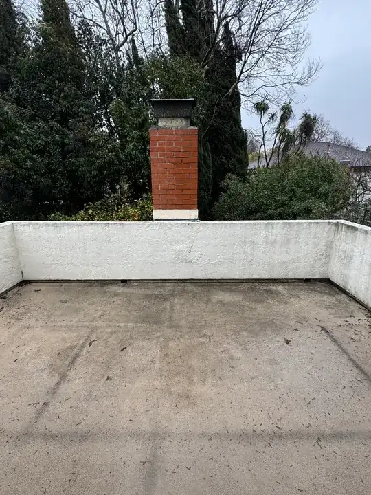 the balcony. It’s poorly graded and water pools up when it rains, right about where the leak is happening