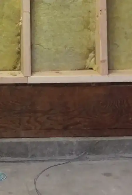 sill plate over floor joist over concrete