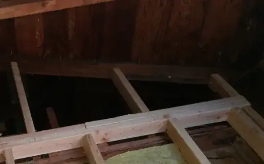 Wall tied to rafters