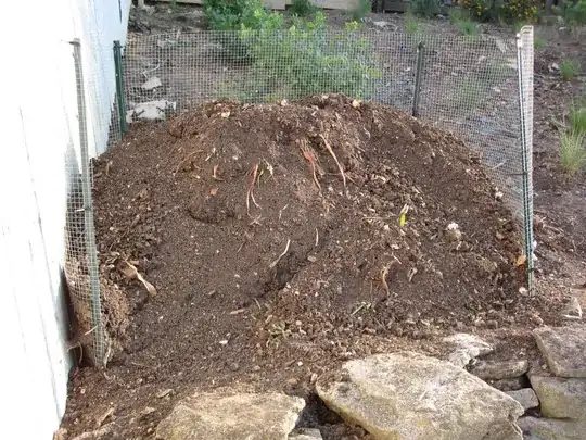 A simple three sided hardware cloth compost pen