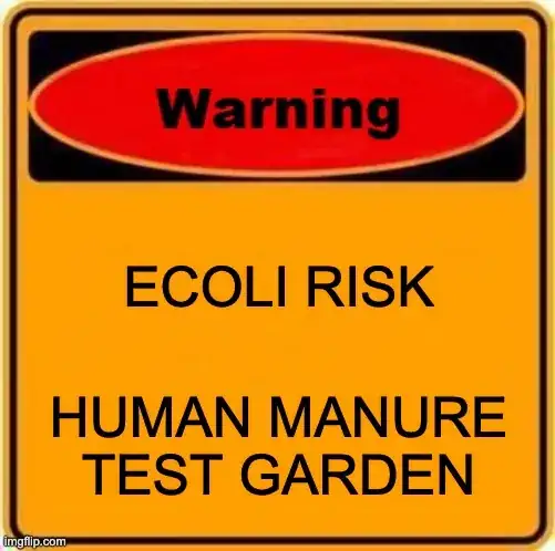 A sign that reads: WARNING ECOLI RISK HUMAN MANURE TEST GARDEN