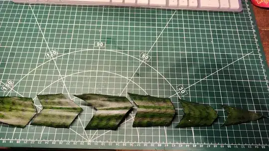 Cutting a snake plant leaf for propagation