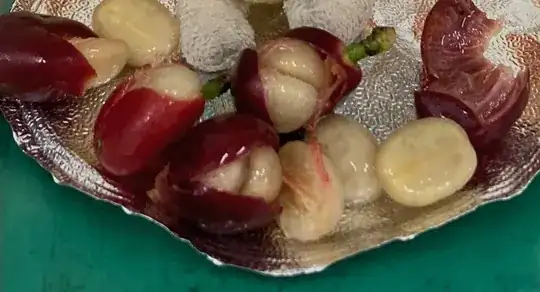 A few of the coffee beans from last year, still in the process of being separated from the fruit