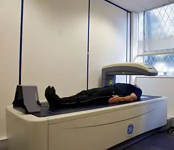 A DXA scanner in use.